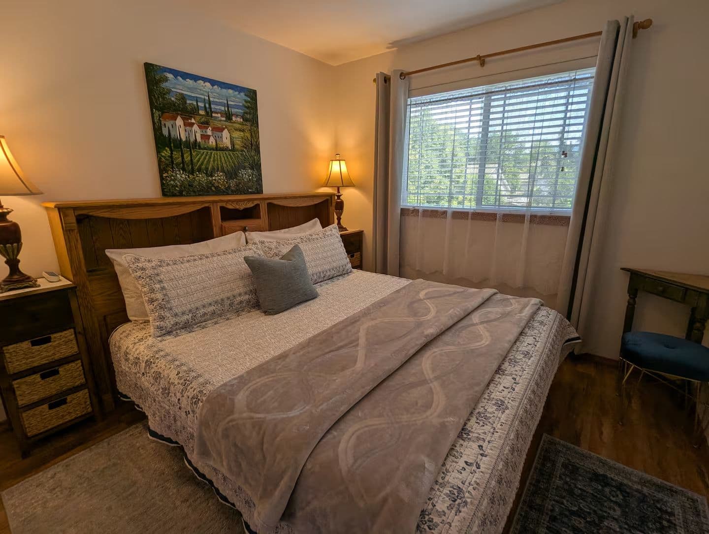 King bed in bedroom with rustic decor